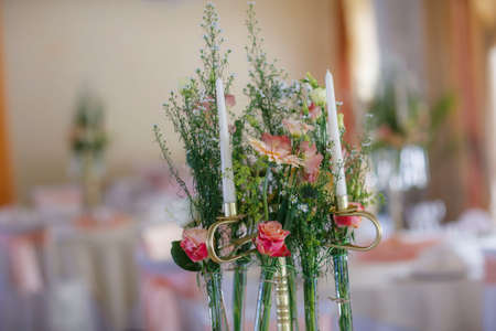 Beautiful wedding bouquet of orange flowers. No people. Vertical color photo.