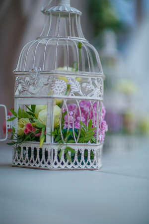 Fresh flowers in a wedding decoration. Night Banquetの写真素材