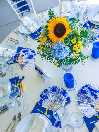Wedding bouquet of bride - colorful flowers pink, white roses and blue freesia and hydrangea at wedding on natureの写真素材