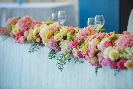 Elegant floral set up for an wedding event with candles litの写真素材
