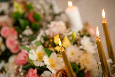 Wedding table for a holiday decorated with fresh flowers for a romantic atmosphere.の写真素材