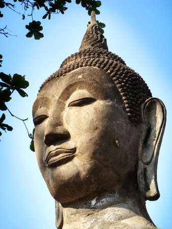 Portrait of a giant buddha's head in Thailandの写真素材