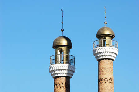 Landmarks of historical mosque towers with blue sky as backgroundの写真素材