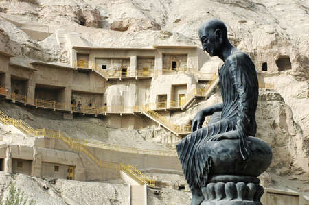 Buddha sculpture at the famous buddhist grottoes in Sinkiangの写真素材