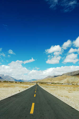 Landscape of a highway road extending to the distanceの写真素材