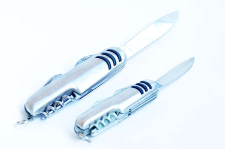 View of two knives with multiful usages on a white backgroundの写真素材