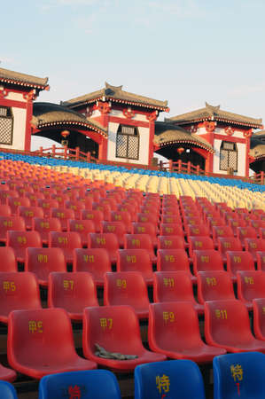 Row of plastic chairs in an open theaterのeditorial素材
