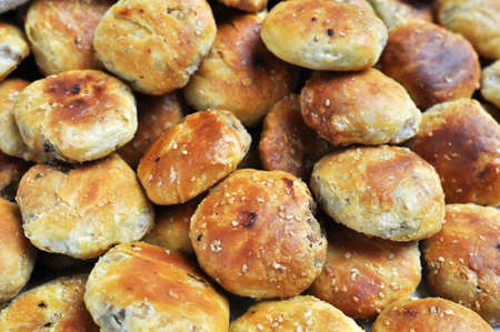 A pile of baked cakesの写真素材