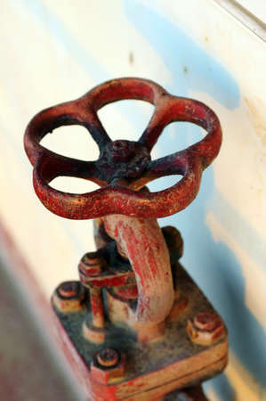 Closeup view of a red gate valveの写真素材