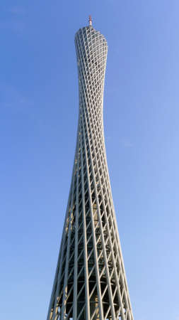 Landmark of modern skyscraper against blue sky