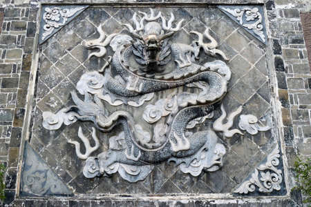 Chinese ancient rock art of dragon carvingsのeditorial素材