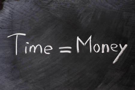 Time is Money written on blackboard
