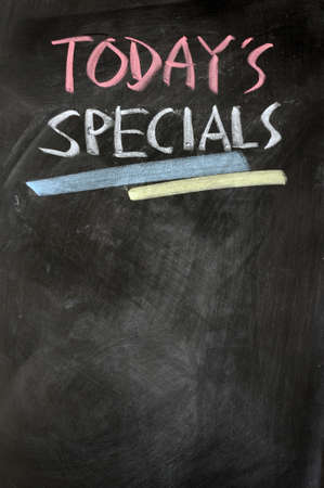 Menu of today's specials written with chalk on a blackboardの写真素材