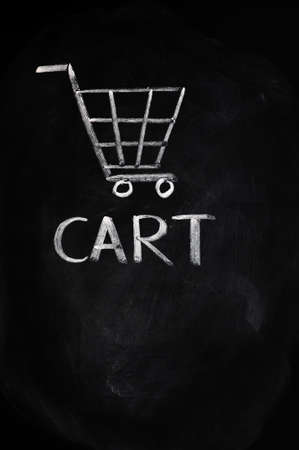 Cart drawn with chalk on a blackboardの写真素材