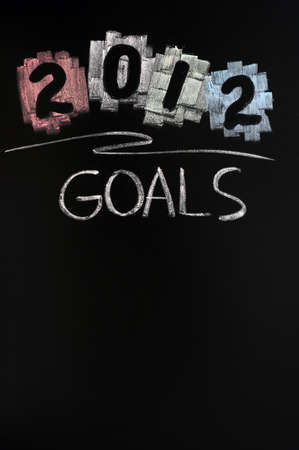 2012 New year goals drawn with chalk on blackboardの写真素材