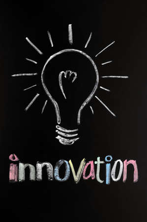 Light bulb drawn with chalk, symbol of innovation and ideaの写真素材