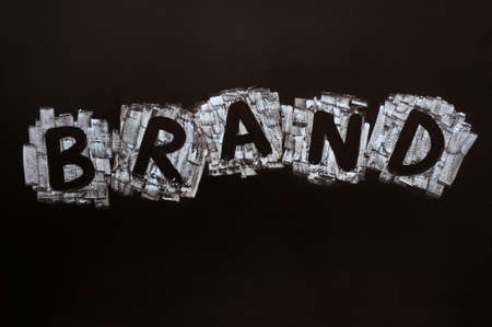 Brand written with chalk on a blackboard