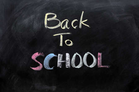Chalkboard Background with a handwriting of back to school