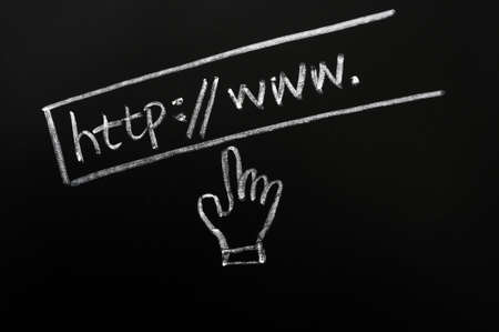 Website address drawn in chalk on a blackboard