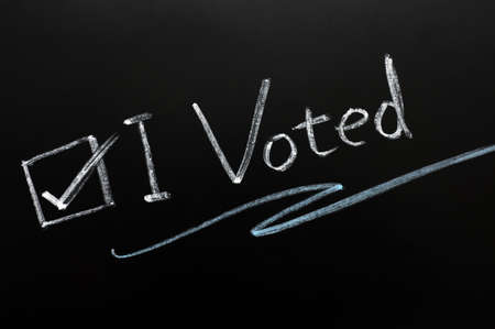 Check box of "I voted" on a blackboardの写真素材