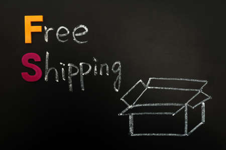 Free shipping concept drawn in chalk on a blackboardの写真素材