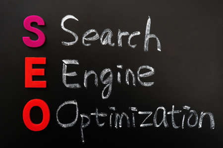 Acronym of SEO - Search engine optimization written on a blackboardの写真素材