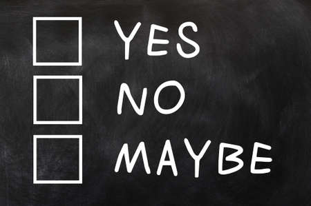 Yes,no and maybe check boxes on a blackboardの写真素材