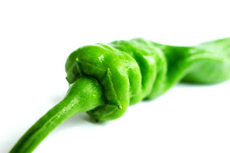 Closeup of Green pepper on a white background