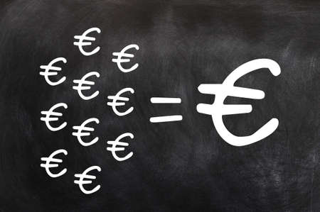 Small savings make a big fortune with Euro symbols- chalk drawing on a blackboard