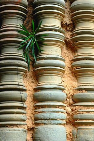 Ancient wall background at Angkor Wat, Cambodiaの写真素材