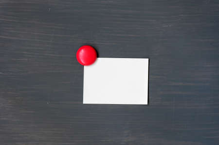 Blank stick note on a blackboard with copy space