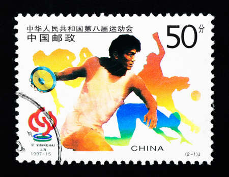 CHINA - CIRCA 1997: A Stamp printed in China shows the 8th National Games in Shanghai with a discus thrower, circa 1997のeditorial素材