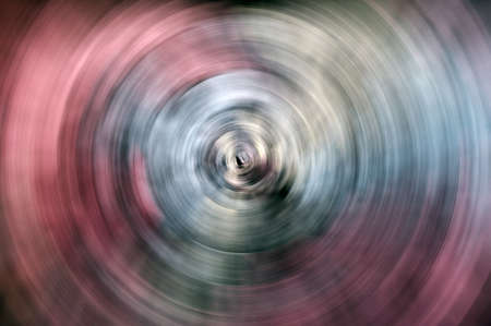 Abstract background of rotating colorful raysの写真素材
