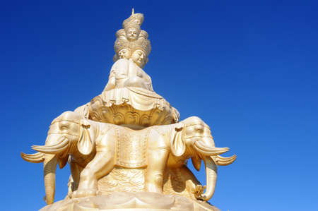The famous Golden Buddha statue at the top of Emei Mountains in Sichuan, Chinaの写真素材