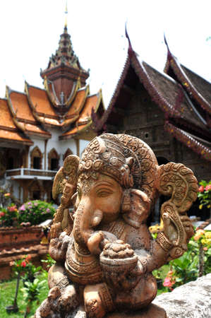 Ancient  sculpture of Indian god Lord Ganesh, god of luck and prosperity in Thailandの写真素材