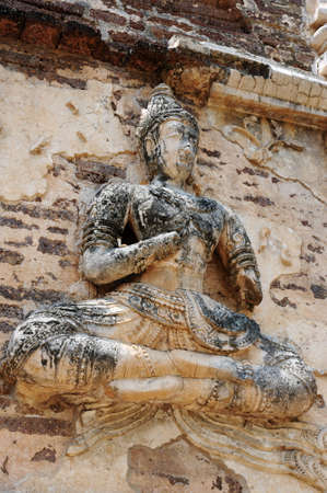 Ancient wat ruins of Buddha sculpture in Chiang Mai,Thailandの写真素材