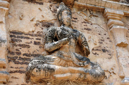 Ancient wat ruins of Buddha sculpture in Chiang Mai,Thailandの写真素材