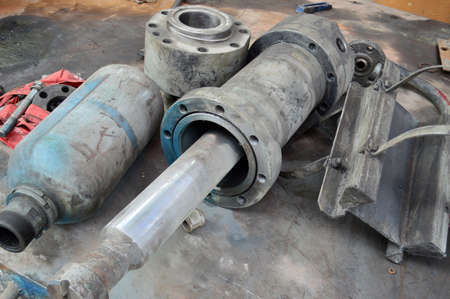 Gears and shafts on the groundの写真素材