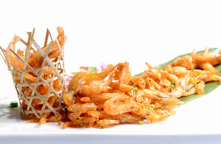 Chinese Food:Fried Shrimp in a bamboo basket on a white backgroundの写真素材