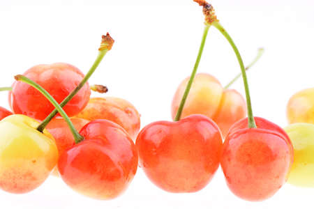 Many sweet cherries isolated on a white backgroundの写真素材