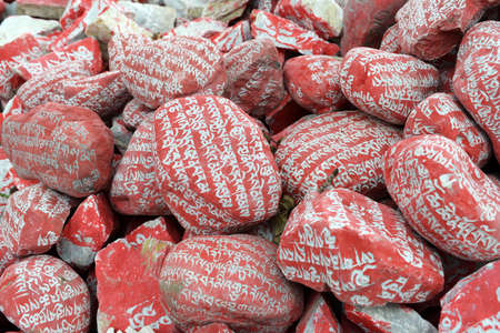 Mani stones with Six-word Theory