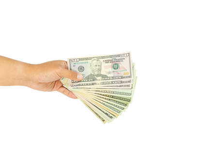 clipping path Close up of stack fifty and twenty new US dollar on hand Money American isolated on...