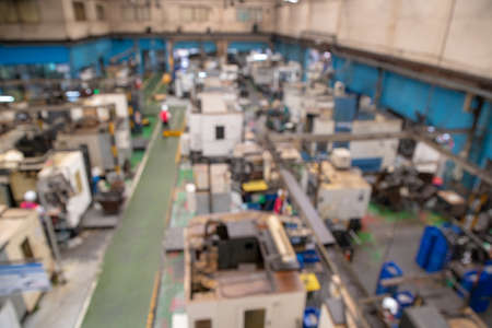 Abstract blur and bokeh Background in factory, industry, construction, processing, warehouse, Equipment, Power Generator, lathe.のeditorial素材