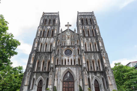 HANOI/VIETNAM - JULY 29: St Joseph's Cathedral is a old church Its a late 19th-century Gothic Revival (Neo-Gothic style) church that serves as the cathedral of the Roman Catholic Archdiocese of Hanoi to nearly 4 million Catholics in the country. in OLD QUのeditorial素材