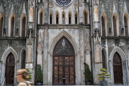 HANOI/VIETNAM - JULY 29: St Joseph's Cathedral is a old church Its a late 19th-century Gothic Revival (Neo-Gothic style) church that serves as the cathedral of the Roman Catholic Archdiocese of Hanoi to nearly 4 million Catholics in the country. in OLD QUのeditorial素材