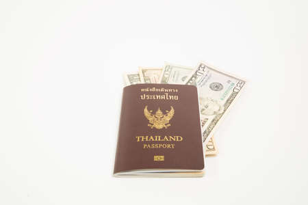 Us dollar in Thailand passport and isolated on white background.の写真素材