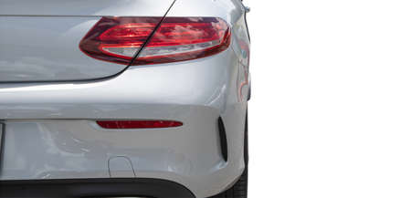 clipping path. Focus of Luxury car Tail light and Rear bumper. Isolated on white background.の写真素材