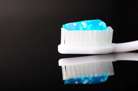 toothbrush with blue toothpaste の写真素材