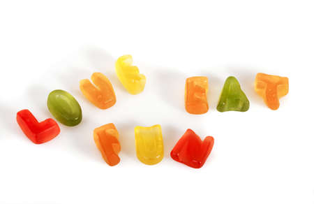 eat, fun and love written by colorful candiesの写真素材