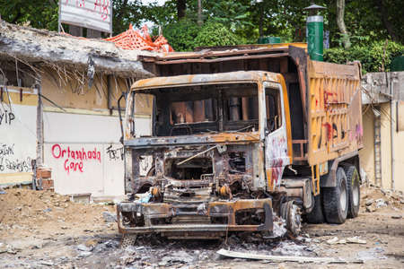 ISTANBUL, TURKEY - JUNE 06, 2013: Damaged vehicle at Gezi Park Public Protest against the government.のeditorial素材